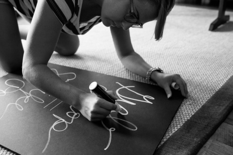 Girl Drawing On Poster